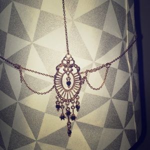 Black jewel and gold headpiece